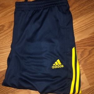 New blue adidas pants w/yellow double stripes